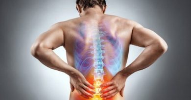 man suffering from back pain