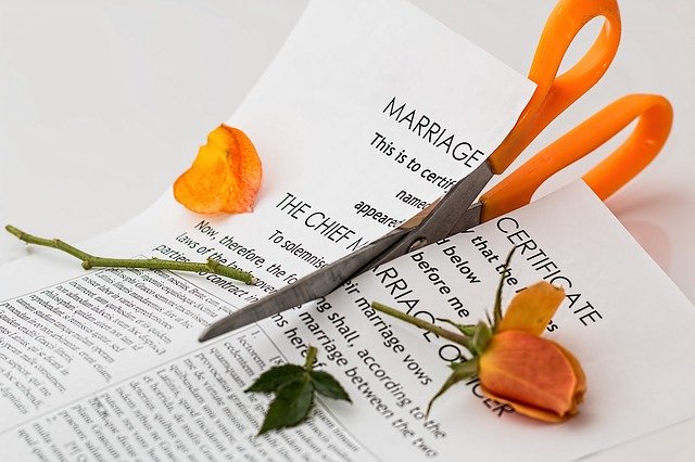 marriage legal contract being cut in divorce