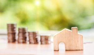 staked coins showing savings for new home mortgage